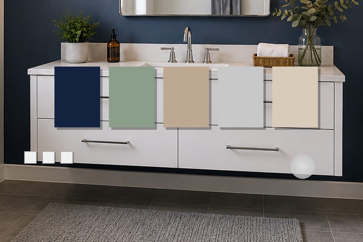 Bathroom Accent Wall Ideas That Actually Work 1 Various paint color samples and chips pinned to bathroom wall showing muted navy, sage green, warm taupe, and soft gray options