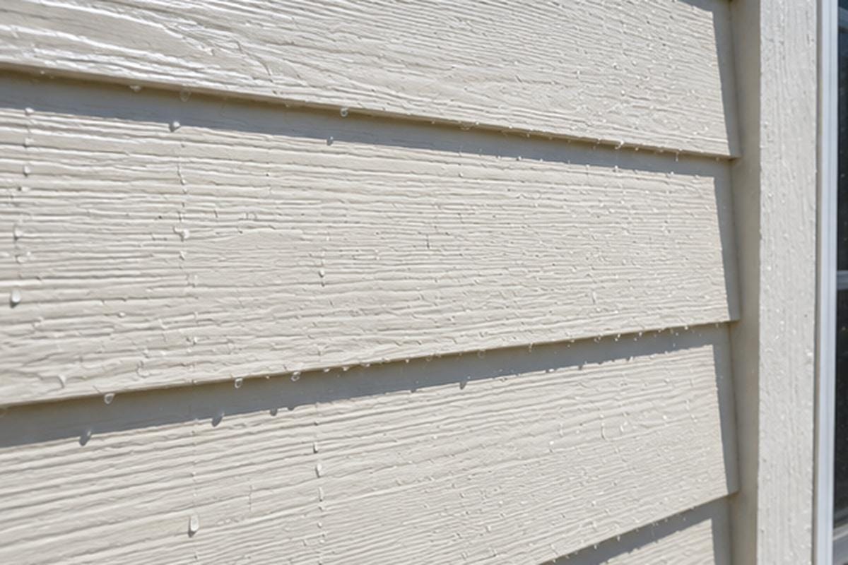 Cost to Pressure Wash a House in 2026: Auburn CA Guide 3 Beautiful clean residential siding after professional pressure washing