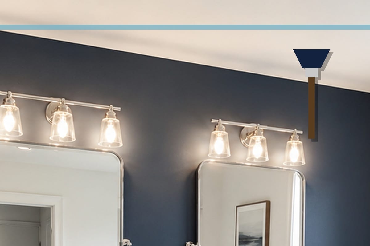 Bathroom Accent Wall Ideas That Actually Work 3 Painter using angled brush to cut paint carefully along the ceiling line of a bathroom accent wall, masking tape visible along edges