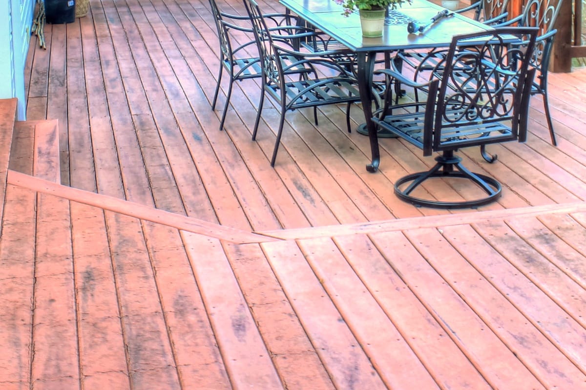 Warm brown stained deck showing natural wood grain and golden tones